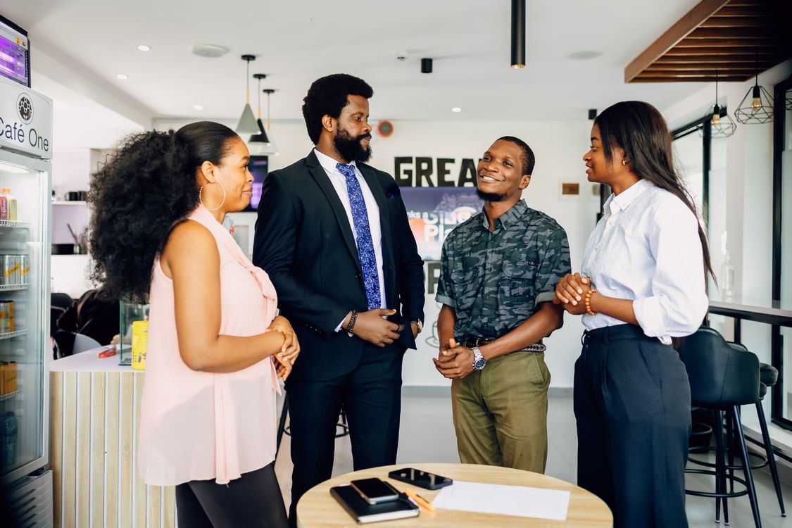 Small business owners and professionals talking together