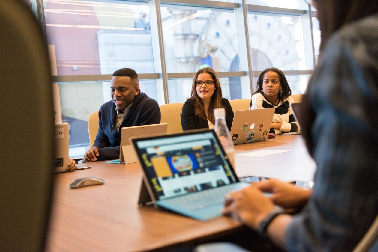 Professionals collaborating around a conference table